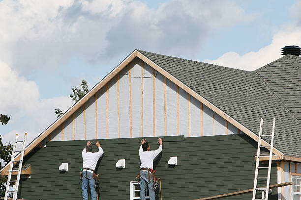 Professional Siding Replacement technician working in Dacono, CO
